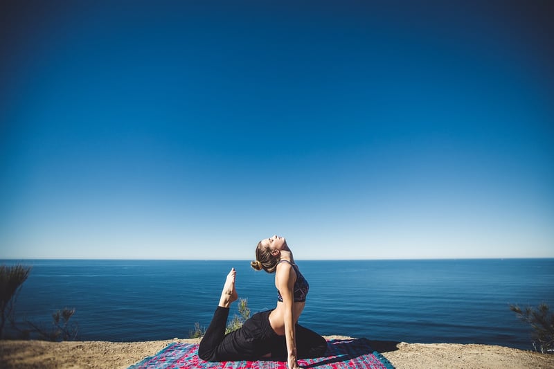 Woman doing yoga stretching exercise